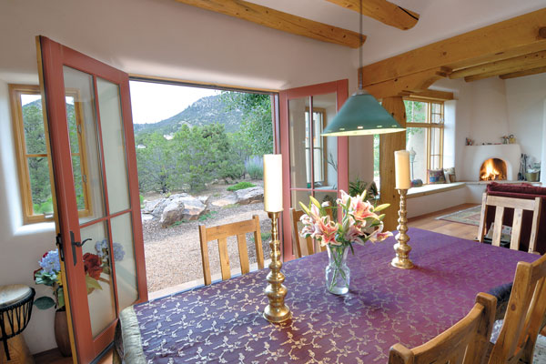 Vigas throughout the house were crafted from logs obtained from local wood from a fire-damaged area in the nearby Jamez Mountains.